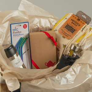 Farmer's Market Organic Tea Gift Bag with travel mug, cold brew travel mug, reusable steel straws, and organic tea sample pack